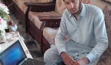 Walid Azhar Minhas of Manianda receives laptop on Prime Minister scheme