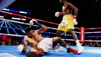 New York; Terence Crawford dominates Amir Khan of Kahuta before farcical low-blow ending