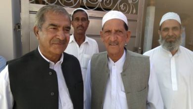 Choa Khalsa; Raja Gulstan Khan holds Millad with Dr Sajid ur Rehman on completion of his house