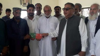 Kallar Syedan; Ch M Azeem and Raja Sajid Javed (PTI) distribute Insaaf health cards at UC Choa Khalsa