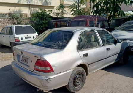 Rawat: Wanted Robber Arrested After Police Encounter in Naseerabad, Stolen Vehicle Recovered